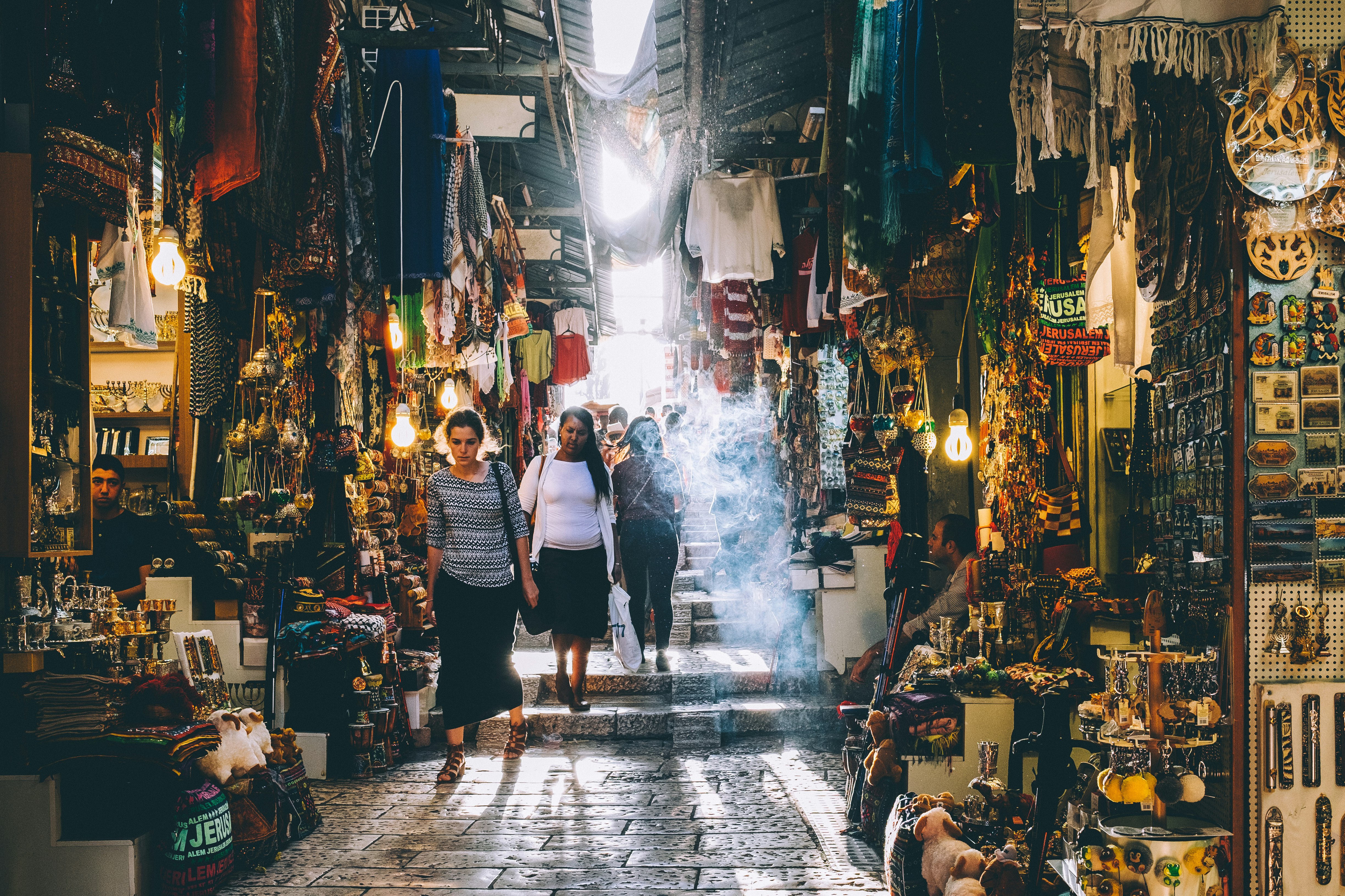 people walking on market during daytime